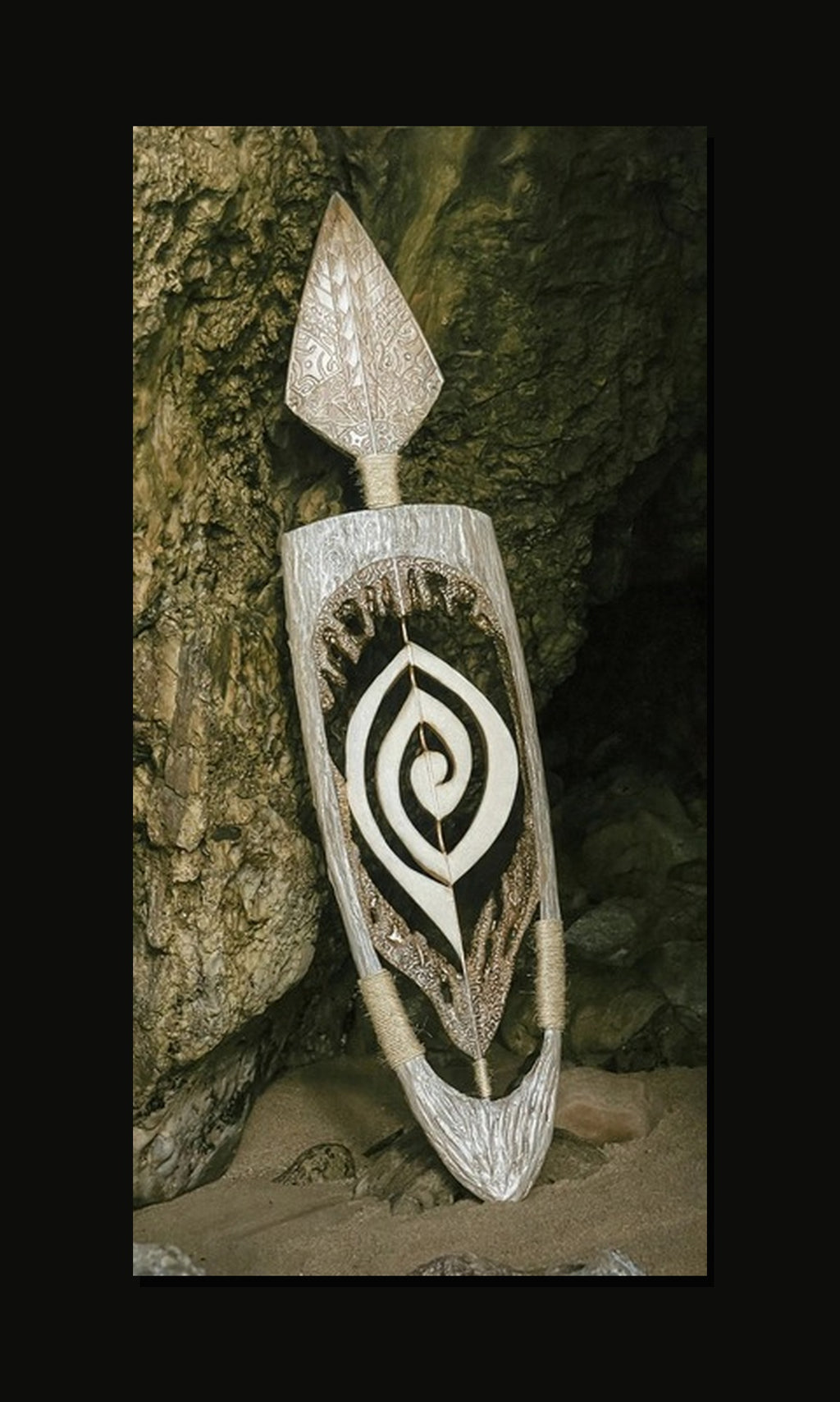 Moana's Koru metal print — right side up (vertical hang) on black